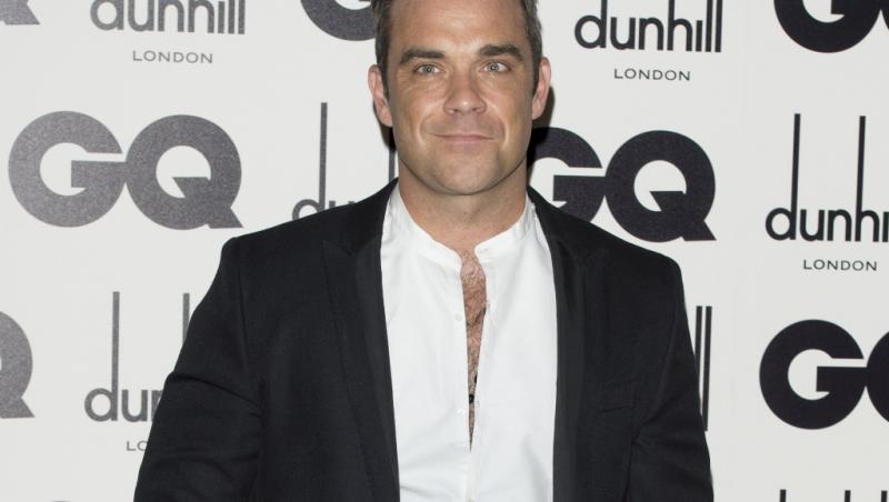 Scandal la un concert Robbie Williams! Cativa fani s-au luat la bataie, in mijlocul multimii