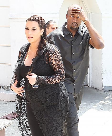 Kanye West a cumparat masini blindate pentru Kim Kardashian si fiica lor