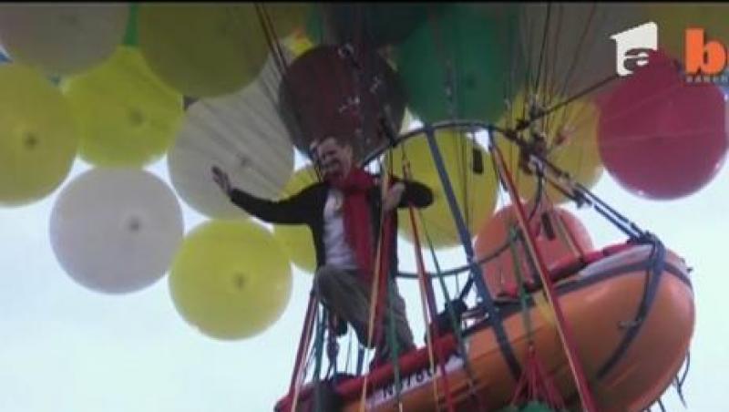 Un american vrea sa traverseze Oceanul Atlantic agatat de 370 de baloane pline cu heliu!