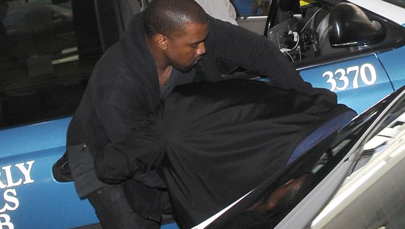 FOTO! Kanye West a fost pus, oficial, sub acuzare pentru agresiune si tentativa de furt