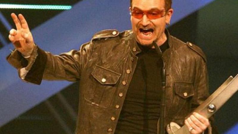 Bono de la U2 este si actor! L-a imitat impecabil pe fostul presedinte american Bill Clinton