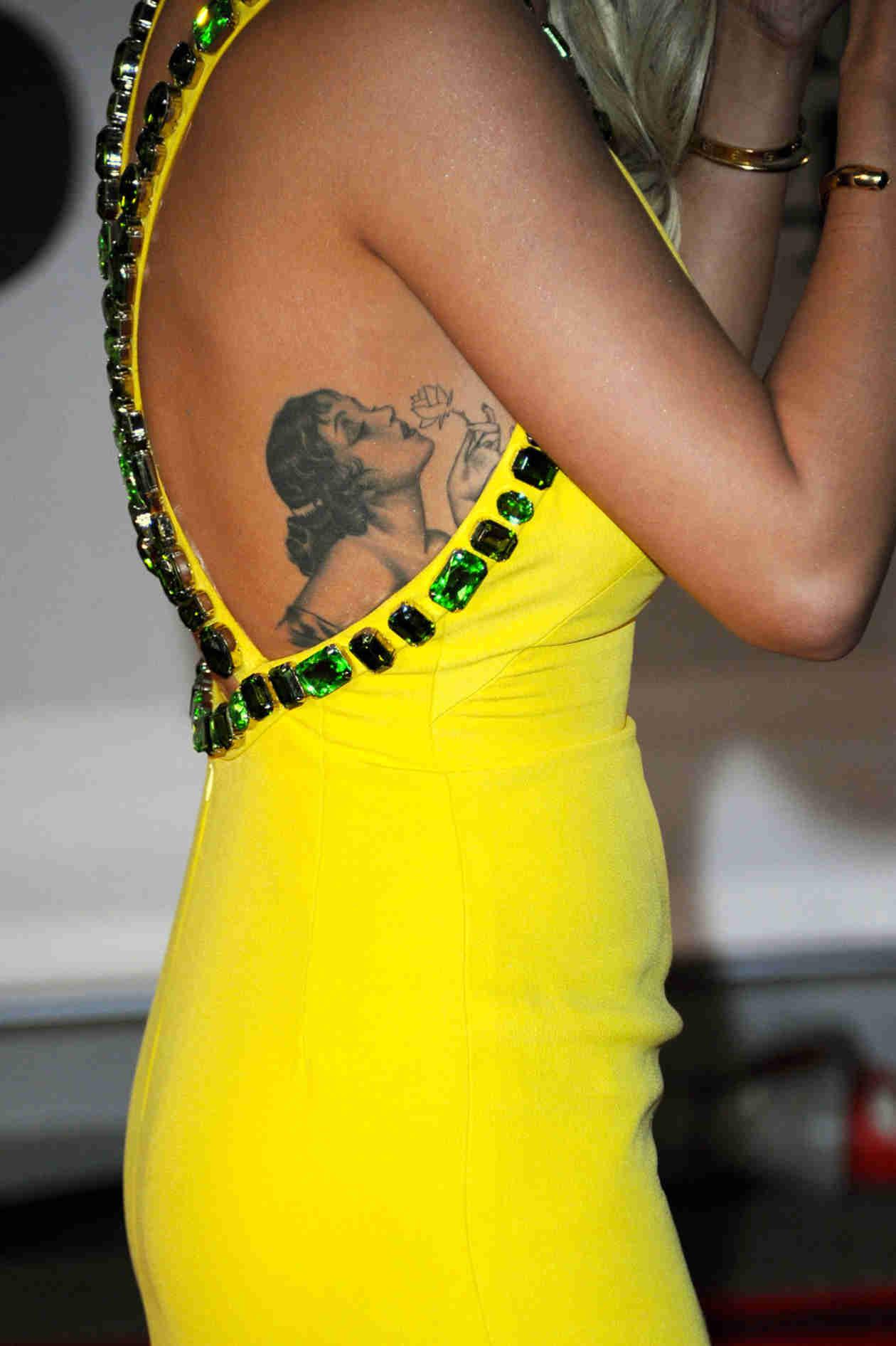 Ghici cui aparţine acest tatuaj?