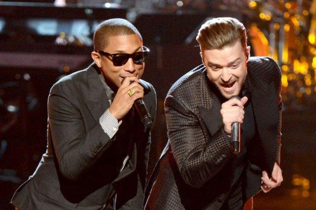 Justin Timberlake, critici prietenești: "Pharrell se distrează mult prea tare"