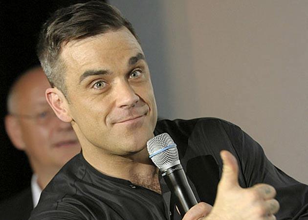 Robbie Williams e cel mai fericit bărbat din lume! Vestea care l-a făcut să ţipe de fericire