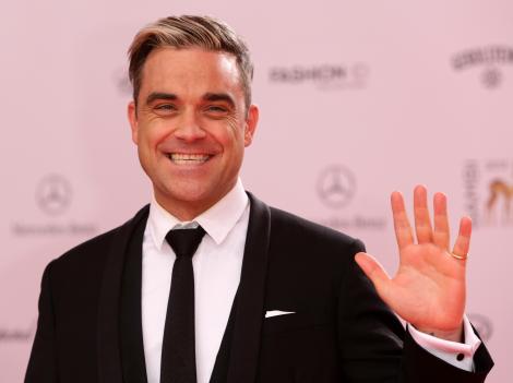 E în culmea fericirii! Robbie Williams va mai avea un copil!