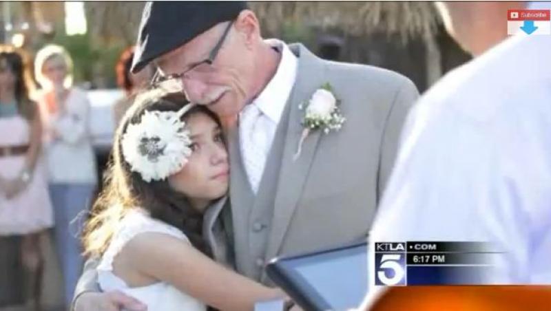 VIDEO! A vrut să-şi vadă fata mireasă! Un tată bolnav de cancer îşi duce fiica de 11 ani la altar