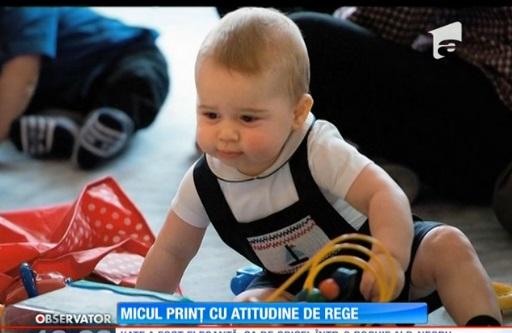 Prinţul George, haine de rege, atitudine de copil! S-a lăsat cu joacă la prima sa ieșire oficială