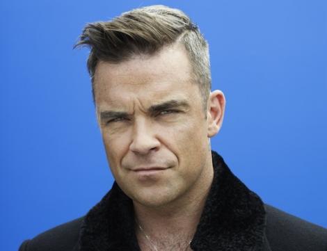 Celebrul Robbie Williams ştie toate melodiile lui Horia Brenciu! Totuşi, juratul X Factor are ceva în plus