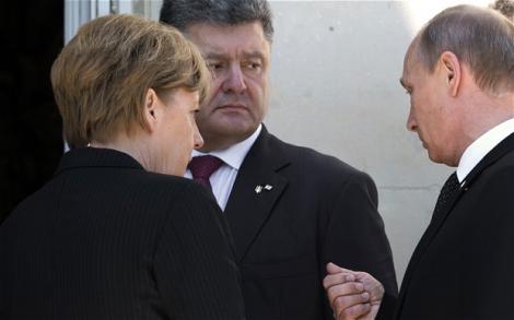 Moment istoric! Putin şi Poroşenko ar putea avea o întrevedere la Minsk