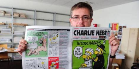 Le Monde: Patru caricaturişti celebri, ucişi în atentatul de la Charlie Hebdo