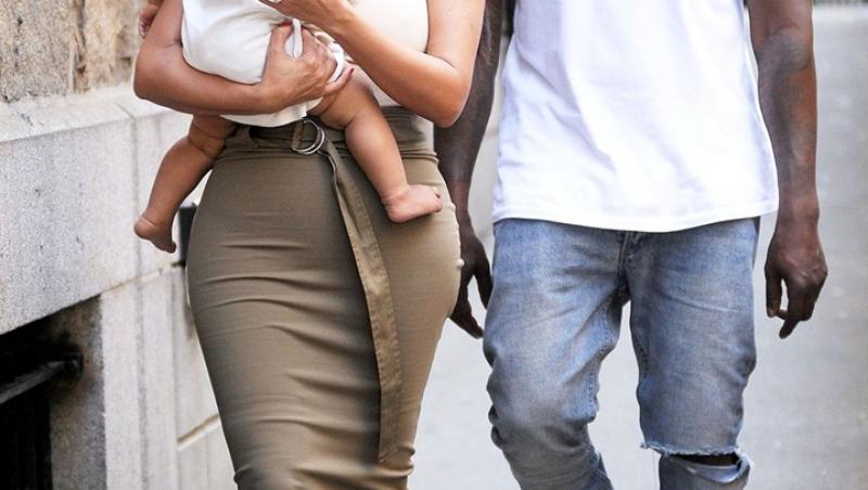 Kim Kardashian şi Kanye West, alături de fetiţa lor