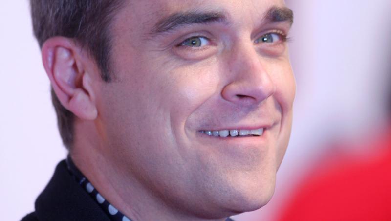Robbie Williams, de la Take That la artist solo! Cum a reuşit să îşi construiască o carieră de succes
