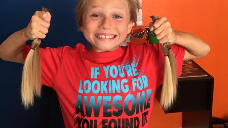 RESPECT: Doi ani de zile, un puști de șase ani și-a lăsat părul să crească. Pentru a-l dona copiilor ce luptă cu cancerul!