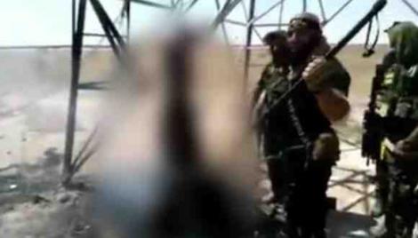 Video șocant! Terorist ISIS, ars de viu: ”Te voi tăia ca pe o shorma!”