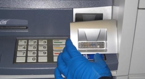 Spărgătorii de bancomate din România foloseau un virus de tip Troian pentru a fura bani din ATM-uri