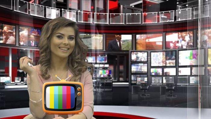 FOTO: Te uiţi la ştiri şi-n direct, şi-n reluare! O prezentatoare TV le-a luat ochii telespectatorilor cu un DECOLTEU generos