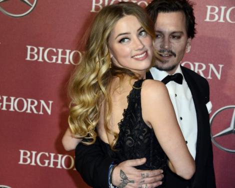 IMAGINILE DURERII! Amber Heard, transfigurată de durere din cauza divorţului de Johnny Depp. A fost surprinsă plângând pe stradă