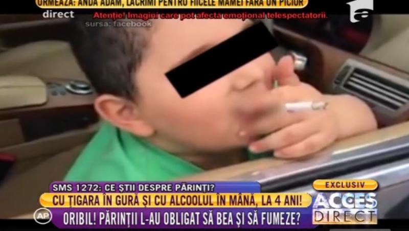 Imagini halucinante! La patru ani, cu ţigara în gură şi amețit de aburii alcoolului! Un tată și-a filmat copilul în aceasta ipostază