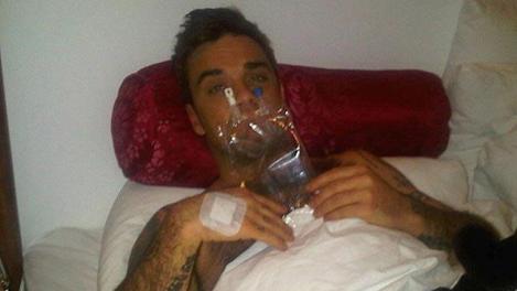 Lacrimi prin fanii lui Robbie Williams! Artistul, internat la terapie intensivă: ''Din păcate, boala a intervenit chiar în timpul turneului!”