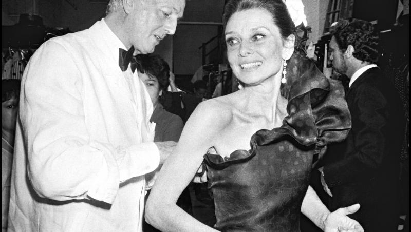 Le-a îmbrăcat pe Audrey Hepburn și Lauren Bacall, actrița cu origini românești. A fost calfă alături de Dior și a creat parfumul pe care orice femeie și-l dorește. GIVENCHY a plecat să creeze rochii pentru îngeri!