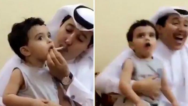 Imagini revoltătoare! Un bărbat se amuză copios, în timp ce forțează un copil de trei ani să fumeze (VIDEO)