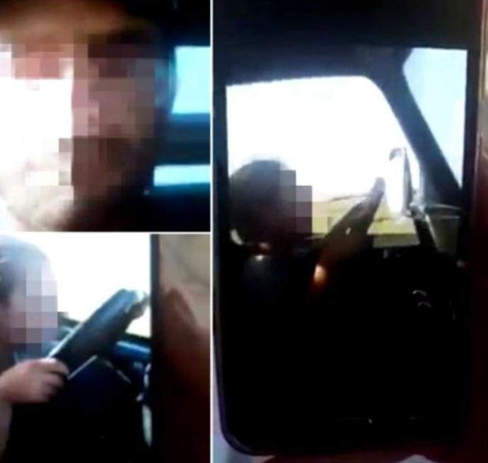 Scene revoltătoare! O fetiță de șase ani, surprinsă la volanul unei camionete! Ce făcea tatăl micuței e șocant! Imaginile au făcut &icirc;nconjurul internetului