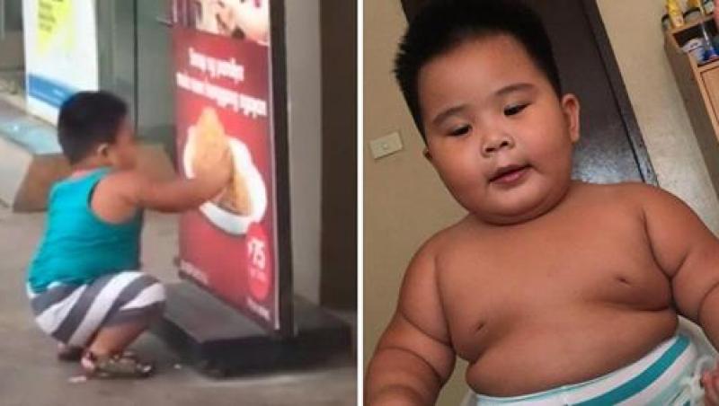 VIRAL: Râzi cu lacrimi! Un băiețel încearcă să mănânce puiul prăjit dintr-un afiș, după ce restaurantul se închisese (VIDEO)