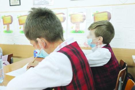 Epidemie de gripă în România. Şcolile şi grădiniţele au trimis acasă sute de copii