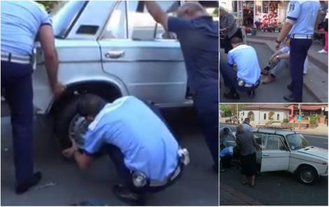 VIDEO/ Așa da! Doi polițiști au fost filmați în timp ce schimbau roata unui bătrânel. „Felicitări că avem și poliție cu inima bună"