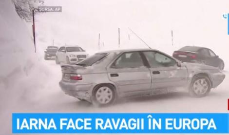 Ninsorile fac probleme în Europa. Sute de șoferi, printre care și români, blocați în nămeți
