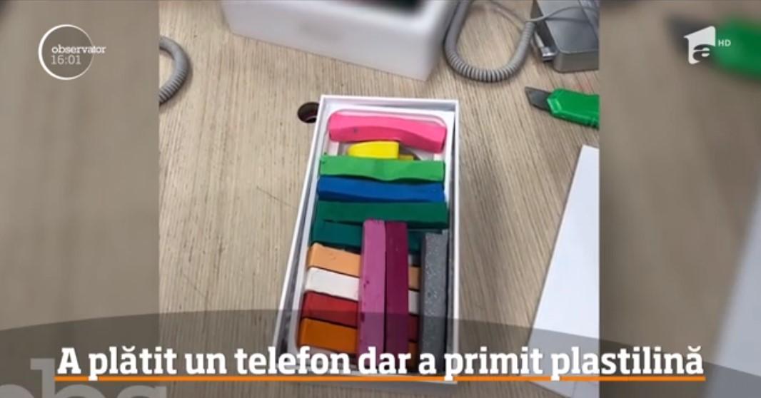 A dat 7.000 de lei pe un telefon de ultimă generaţie. C&acirc;nd a deschis cutia, șoc! Magazinul i-a dat o cutie plină cu plastilină colorată