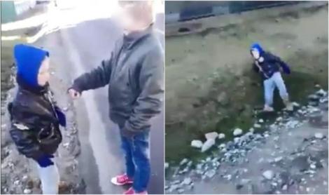 Filmuleț cu un băiat de 10 ani umilit și bătut de alți copii, în Neamț! Micuțul e aruncat în șanț după ce e obligat să se roage în genunchi!
