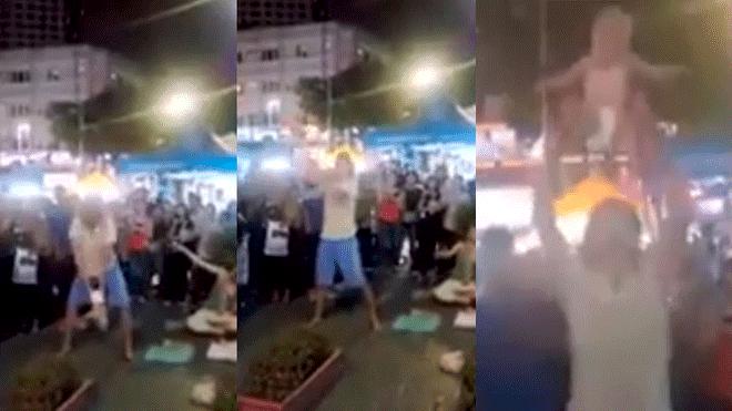 Video. O pereche de părinți inconștienți face piruete periculoase cu bebelușul pentru a str&acirc;nge bani pe stradă. Spectatorii sunt &icirc;ngroziți de modul &icirc;n care este abuzat micuțul