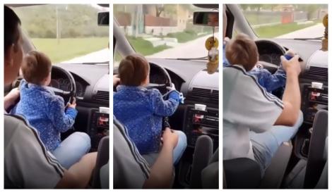 Imaginile groazei! Fetiță de 1 an, filmată la volan cu suzeta în gură!