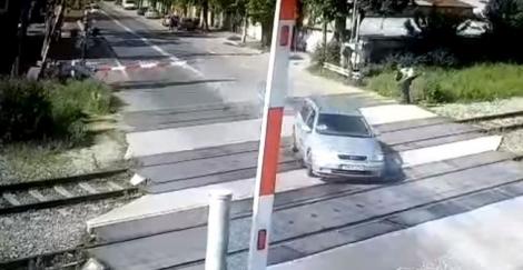 Video. Cursă nebună în București! Un șofer vitezoman spulberă bariera de la o trecere cu cale ferată din București