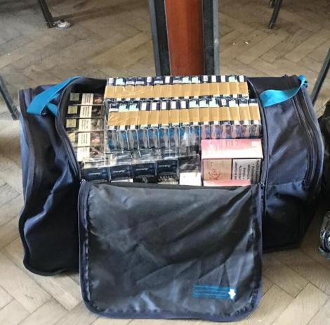 Percheziţii în Bucureşti şi în judeţele Argeş şi Suceava la persoane bănuite de contrabandă cu ţigări
