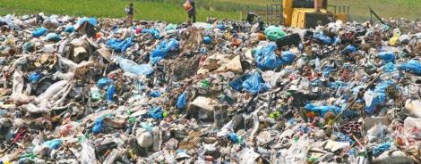 Gorj: Anchetă a Gărzii de Mediu după ce zeci de tone de deşeuri au fost descoperite într-o carieră a Complexului Energetic Oltenia