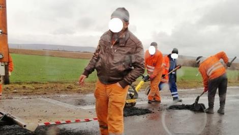 Petice de asfalt, puse pe ploaie, pe DN1:”Săptămâna trecută făceau același lucru, în același loc”