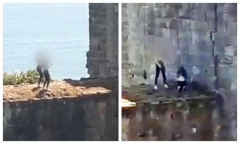 Două adolescente, imagini scandaloase pe ruinele unui castel! Ce au făcut, la 18 metri înălțime, este de necrezut! „Dacă ar fi căzut, s-ar fi prăpădit!” – VIDEO