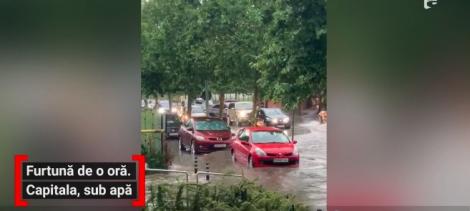 Bucureştiul s-a inundat după o ploaie torențială! Apa a acoperit carosabilul în mai multe zone