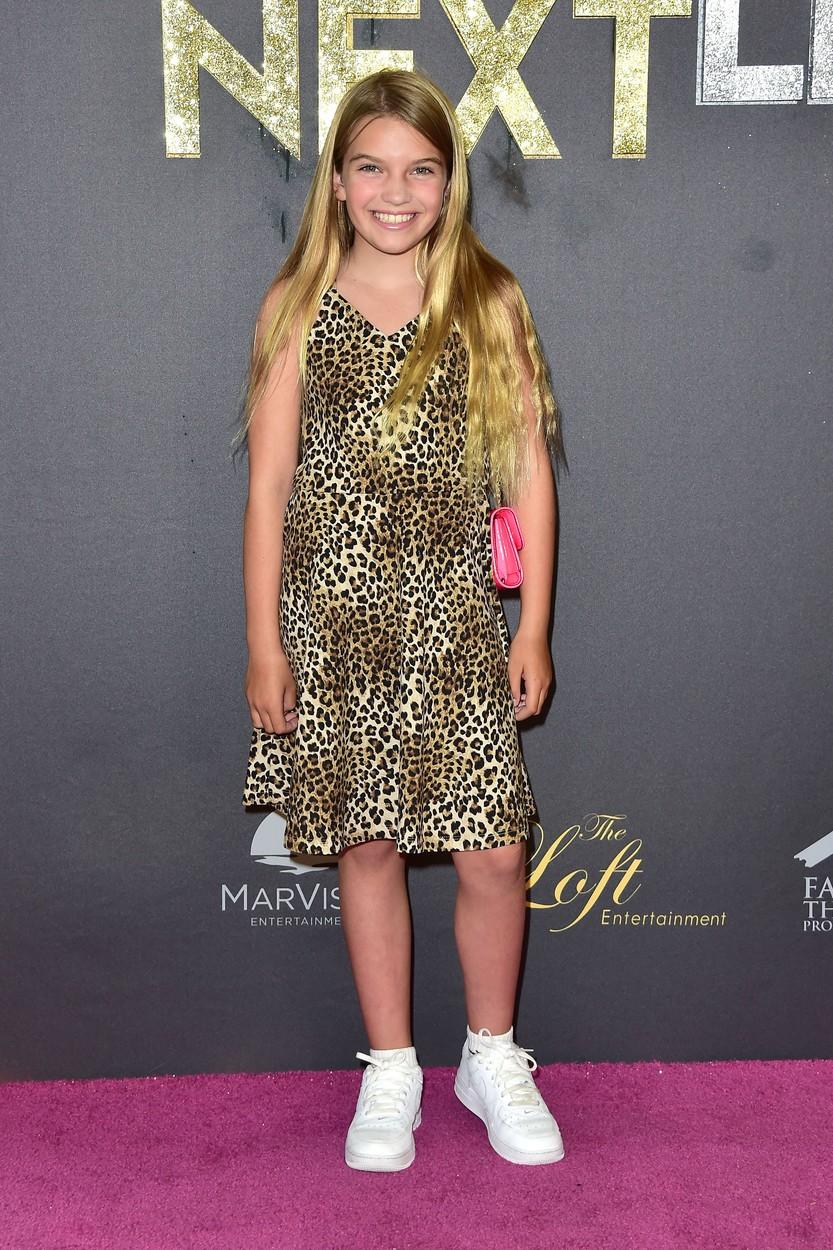 Mia Talerico, în anul 2019, purtând o rochie cu model animal print