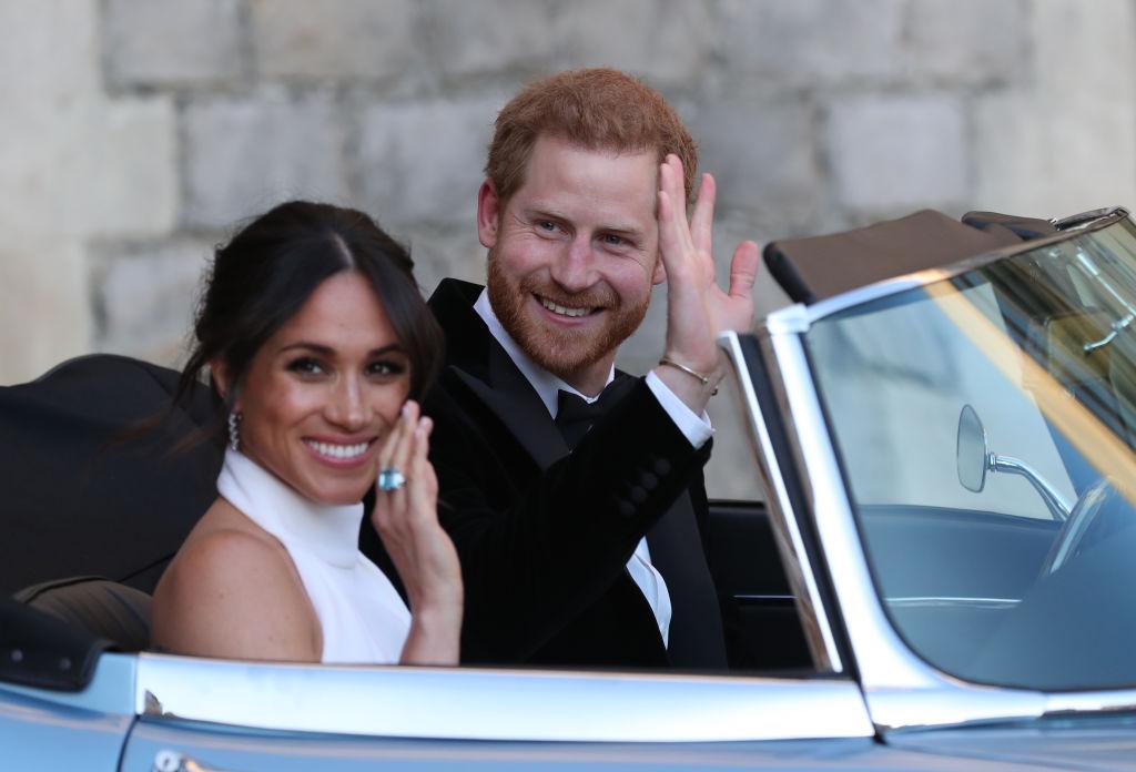 Meghan Markle, într-o mașină decapotabilă, alături de prințul Harry