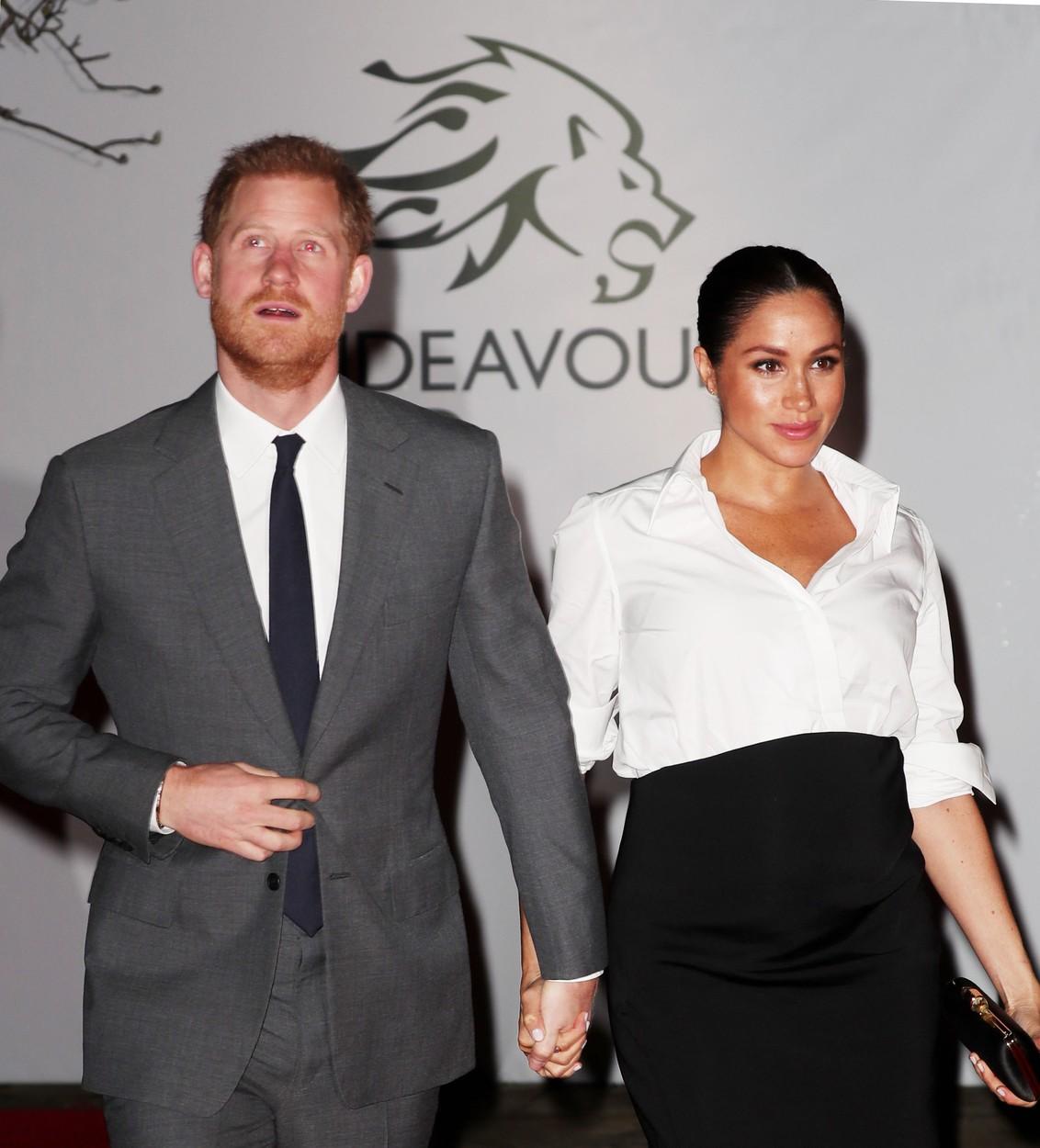 printul harry si sotia sa meghan markle la un eveniment monden