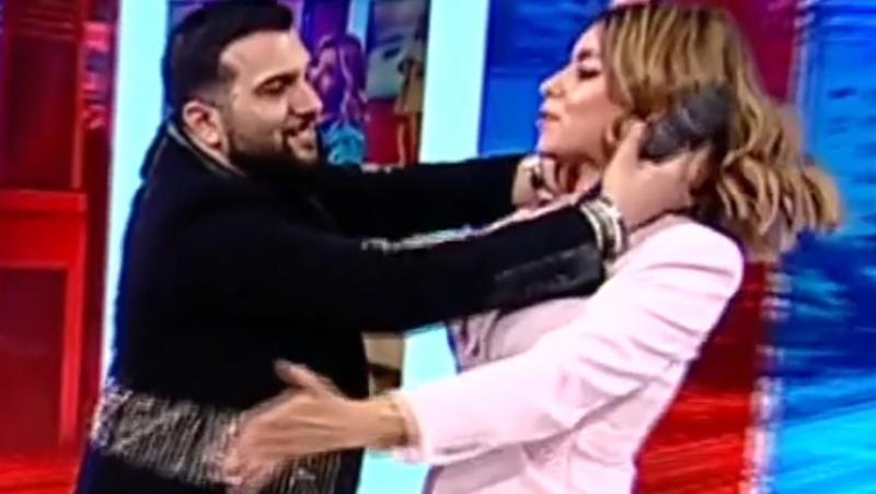 Tzanca Uraganu i-a furat un sărut în direct Nataliei Mateuț, prezentatoarea TV. Camerele au surprins totul | Video