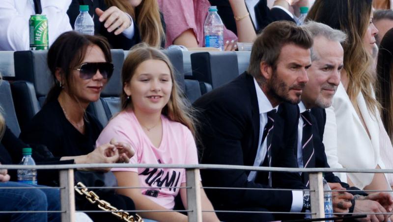 David și Victoria Beckham împreună cu fetița lor, Harper