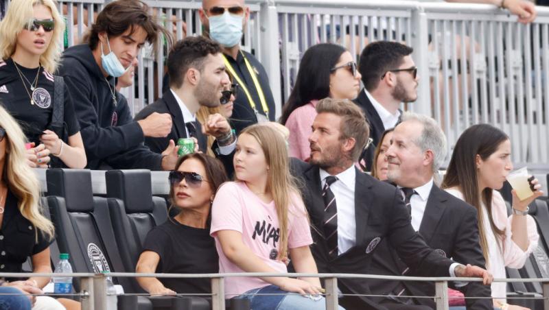 David și Victoria Beckham împreună cu fetița lor, Harper