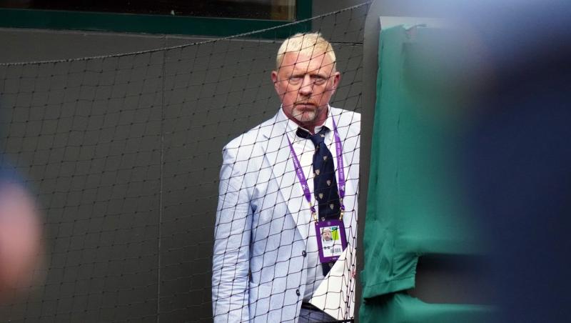 Boris Becker intr-o sacou deschis la culoare si o cravata neagra