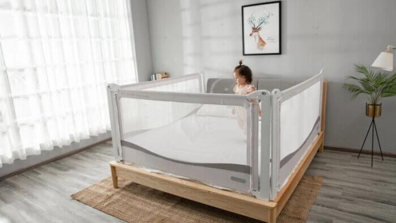 (P) Cum ajustezi în mod corespunzător o barieră de protecție pentru patul lui bebe?