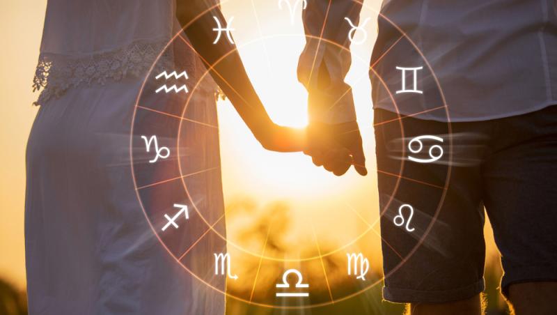 imagine cu un cuplu tinandu-se de mana si simbolurile zodiilor din horoscop, in cerc
