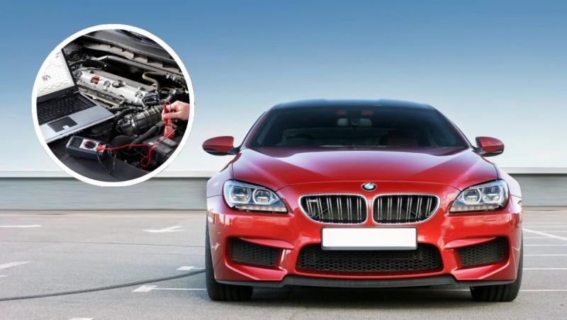colaj BMW roșu și motor de mașină la tester în service